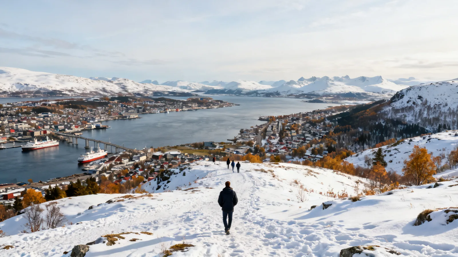 Autumn colour and snow in a coastal town